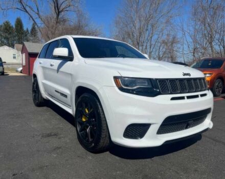 Белый Джип Гранд Чероки, объемом двигателя 6.2 л и пробегом 39 тыс. км за 12400 $, фото 1 на Automoto.ua