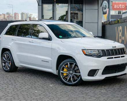 Білий Джип Grand Cherokee, об'ємом двигуна 6.2 л та пробігом 148 тис. км за 57700 $, фото 1 на Automoto.ua