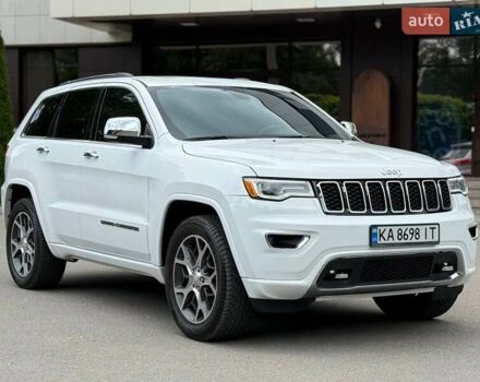 Білий Джип Grand Cherokee, об'ємом двигуна 5.65 л та пробігом 97 тис. км за 34900 $, фото 1 на Automoto.ua