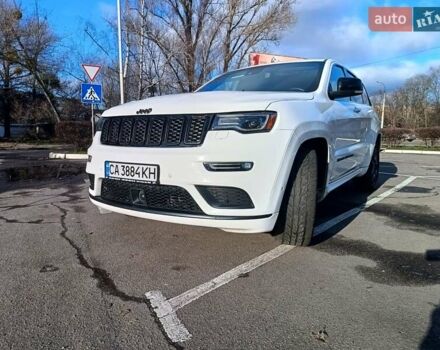 Білий Джип Grand Cherokee, об'ємом двигуна 5.65 л та пробігом 154 тис. км за 28900 $, фото 1 на Automoto.ua