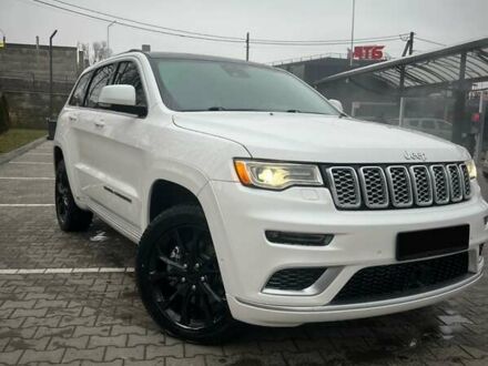 Білий Джип Grand Cherokee, об'ємом двигуна 5.65 л та пробігом 76 тис. км за 40000 $, фото 1 на Automoto.ua