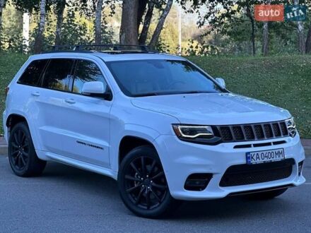 Белый Джип Гранд Чероки, объемом двигателя 5.65 л и пробегом 54 тыс. км за 35800 $, фото 1 на Automoto.ua