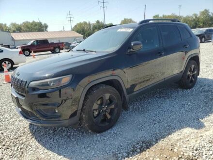 Белый Джип Гранд Чероки, объемом двигателя 3.6 л и пробегом 147 тыс. км за 6000 $, фото 1 на Automoto.ua