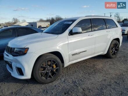 Белый Джип Гранд Чероки, объемом двигателя 6.2 л и пробегом 58 тыс. км за 55000 $, фото 1 на Automoto.ua