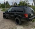 Бежевий Джип Grand Cherokee, об'ємом двигуна 4 л та пробігом 303 тис. км за 5900 $, фото 1 на Automoto.ua