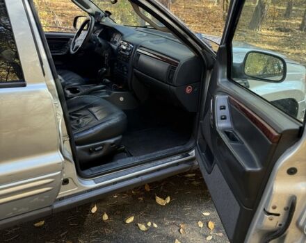 Джип Grand Cherokee 2002 у Києві на Automoto.ua Бежевий Джип Grand Cherokee, об'ємом двигуна 1.2 л та пробігом 280 тис. км за 3700 $, фото 11 на Automoto.ua