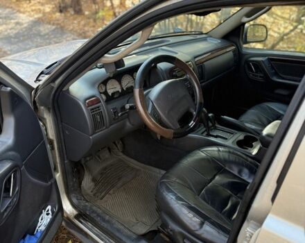 Джип Grand Cherokee 2002 у Києві на Automoto.ua Бежевий Джип Grand Cherokee, об'ємом двигуна 1.2 л та пробігом 280 тис. км за 3700 $, фото 7 на Automoto.ua