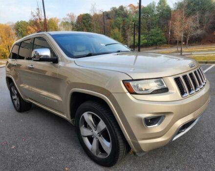 Бежевый Джип Гранд Чероки, объемом двигателя 5.7 л и пробегом 86 тыс. км за 9500 $, фото 2 на Automoto.ua