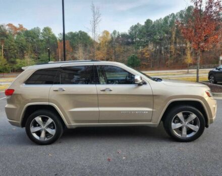 Бежевый Джип Гранд Чероки, объемом двигателя 5.7 л и пробегом 86 тыс. км за 9500 $, фото 3 на Automoto.ua