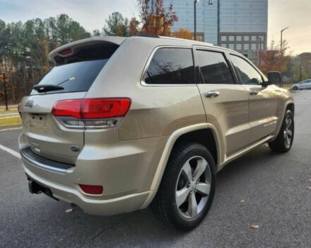 Бежевый Джип Гранд Чероки, объемом двигателя 5.7 л и пробегом 86 тыс. км за 9500 $, фото 4 на Automoto.ua