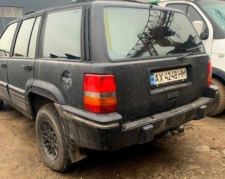 Чорний Джип Grand Cherokee, об'ємом двигуна 4 л та пробігом 200 тис. км за 4500 $, фото 2 на Automoto.ua