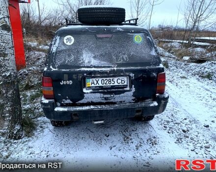 Чорний Джип Grand Cherokee, об'ємом двигуна 4 л та пробігом 1 тис. км за 5000 $, фото 4 на Automoto.ua