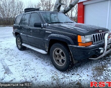 Чорний Джип Grand Cherokee, об'ємом двигуна 4 л та пробігом 1 тис. км за 5000 $, фото 2 на Automoto.ua