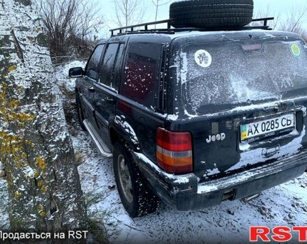 Чорний Джип Grand Cherokee, об'ємом двигуна 4 л та пробігом 1 тис. км за 5000 $, фото 5 на Automoto.ua