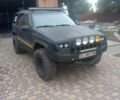 Черный Джип Гранд Чероки, объемом двигателя 5.2 л и пробегом 140 тыс. км за 7500 $, фото 1 на Automoto.ua