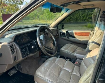 Черный Джип Гранд Чероки, объемом двигателя 5.2 л и пробегом 345 тыс. км за 5900 $, фото 4 на Automoto.ua