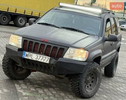 Чорний Джип Grand Cherokee, об'ємом двигуна 3 л та пробігом 239 тис. км за 3750 $, фото 2 на Automoto.ua
