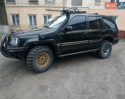 Черный Джип Гранд Чероки, объемом двигателя 5.2 л и пробегом 350 тыс. км за 5400 $, фото 7 на Automoto.ua