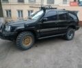 Черный Джип Гранд Чероки, объемом двигателя 5.2 л и пробегом 350 тыс. км за 5400 $, фото 7 на Automoto.ua