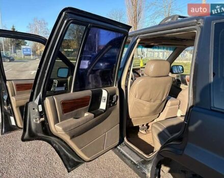 Черный Джип Гранд Чероки, объемом двигателя 5.2 л и пробегом 350 тыс. км за 4500 $, фото 11 на Automoto.ua