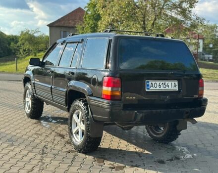 Черный Джип Гранд Чероки, объемом двигателя 5.2 л и пробегом 345 тыс. км за 5900 $, фото 2 на Automoto.ua