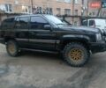 Черный Джип Гранд Чероки, объемом двигателя 5.2 л и пробегом 350 тыс. км за 5400 $, фото 2 на Automoto.ua