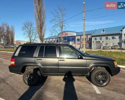 Черный Джип Гранд Чероки, объемом двигателя 5.2 л и пробегом 350 тыс. км за 4500 $, фото 3 на Automoto.ua