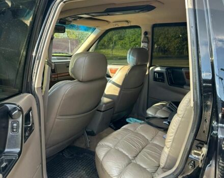 Черный Джип Гранд Чероки, объемом двигателя 5.2 л и пробегом 345 тыс. км за 5900 $, фото 5 на Automoto.ua