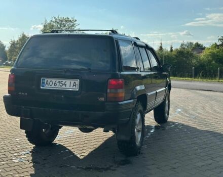 Черный Джип Гранд Чероки, объемом двигателя 5.2 л и пробегом 345 тыс. км за 5900 $, фото 6 на Automoto.ua