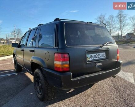 Черный Джип Гранд Чероки, объемом двигателя 5.2 л и пробегом 350 тыс. км за 4500 $, фото 7 на Automoto.ua