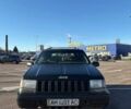 Черный Джип Гранд Чероки, объемом двигателя 5.2 л и пробегом 350 тыс. км за 4500 $, фото 1 на Automoto.ua