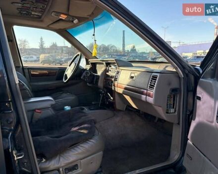 Черный Джип Гранд Чероки, объемом двигателя 5.2 л и пробегом 350 тыс. км за 4500 $, фото 12 на Automoto.ua