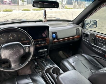 Черный Джип Гранд Чероки, объемом двигателя 5.2 л и пробегом 300 тыс. км за 7500 $, фото 2 на Automoto.ua