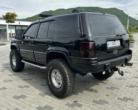 Чорний Джип Grand Cherokee, об'ємом двигуна 5.2 л та пробігом 304 тис. км за 9650 $, фото 2 на Automoto.ua