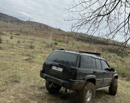 Черный Джип Гранд Чероки, объемом двигателя 5.2 л и пробегом 300 тыс. км за 7500 $, фото 5 на Automoto.ua