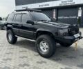 Черный Джип Гранд Чероки, объемом двигателя 5.2 л и пробегом 300 тыс. км за 7500 $, фото 1 на Automoto.ua