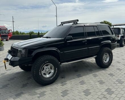 Чорний Джип Grand Cherokee, об'ємом двигуна 5.2 л та пробігом 304 тис. км за 9650 $, фото 6 на Automoto.ua