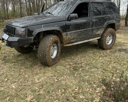 Черный Джип Гранд Чероки, объемом двигателя 5.2 л и пробегом 300 тыс. км за 7500 $, фото 6 на Automoto.ua