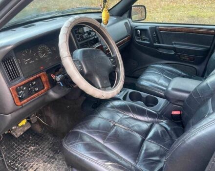 Черный Джип Гранд Чероки, объемом двигателя 4 л и пробегом 400 тыс. км за 2900 $, фото 7 на Automoto.ua