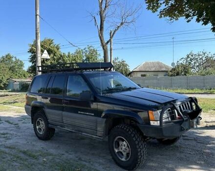 Черный Джип Гранд Чероки, объемом двигателя 3 л и пробегом 130 тыс. км за 7800 $, фото 3 на Automoto.ua