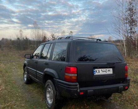 Черный Джип Гранд Чероки, объемом двигателя 4 л и пробегом 400 тыс. км за 2900 $, фото 3 на Automoto.ua