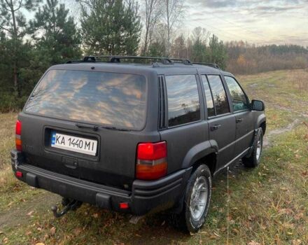 Черный Джип Гранд Чероки, объемом двигателя 4 л и пробегом 400 тыс. км за 2900 $, фото 4 на Automoto.ua