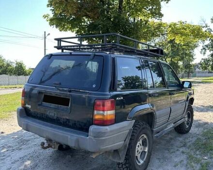 Черный Джип Гранд Чероки, объемом двигателя 3 л и пробегом 130 тыс. км за 7800 $, фото 7 на Automoto.ua