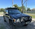 Черный Джип Гранд Чероки, объемом двигателя 3 л и пробегом 130 тыс. км за 7800 $, фото 4 на Automoto.ua