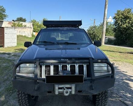 Черный Джип Гранд Чероки, объемом двигателя 3 л и пробегом 130 тыс. км за 7800 $, фото 5 на Automoto.ua