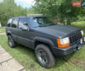 Черный Джип Гранд Чероки, объемом двигателя 4 л и пробегом 399 тыс. км за 6500 $, фото 1 на Automoto.ua