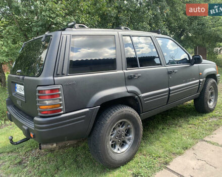 Черный Джип Гранд Чероки, объемом двигателя 4 л и пробегом 399 тыс. км за 6500 $, фото 2 на Automoto.ua