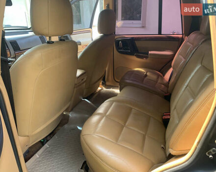 Черный Джип Гранд Чероки, объемом двигателя 4 л и пробегом 399 тыс. км за 6500 $, фото 7 на Automoto.ua