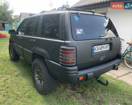 Черный Джип Гранд Чероки, объемом двигателя 4 л и пробегом 399 тыс. км за 6500 $, фото 3 на Automoto.ua