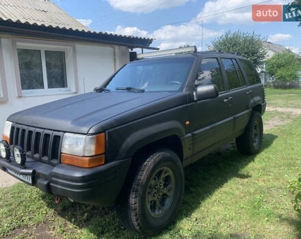 Черный Джип Гранд Чероки, объемом двигателя 4 л и пробегом 399 тыс. км за 6500 $, фото 1 на Automoto.ua